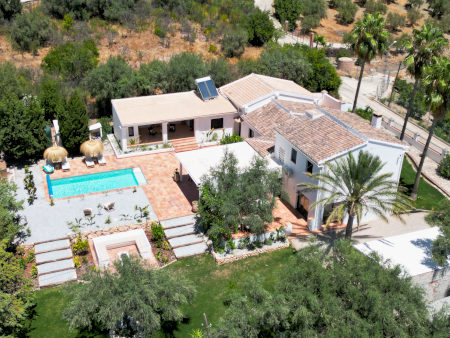 For sale: Beautiful Andalusian Cortijo with some buildings a huge terrace and a pool near Periana in the Axarquia