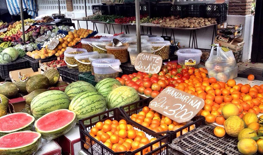 Weekly market with fruits and vegetables in a white village of Andalusia